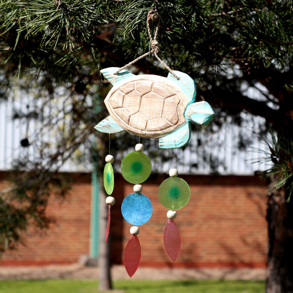 Aqua Turtle Carving with Raffia and Driftwood Drop