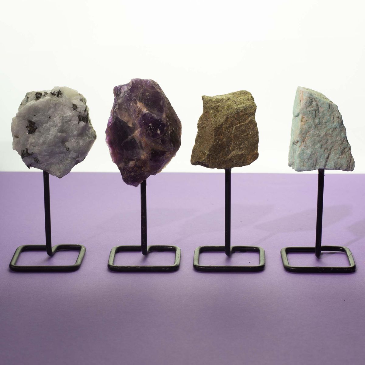 Epidote Mineral Specimen on Metal Stand